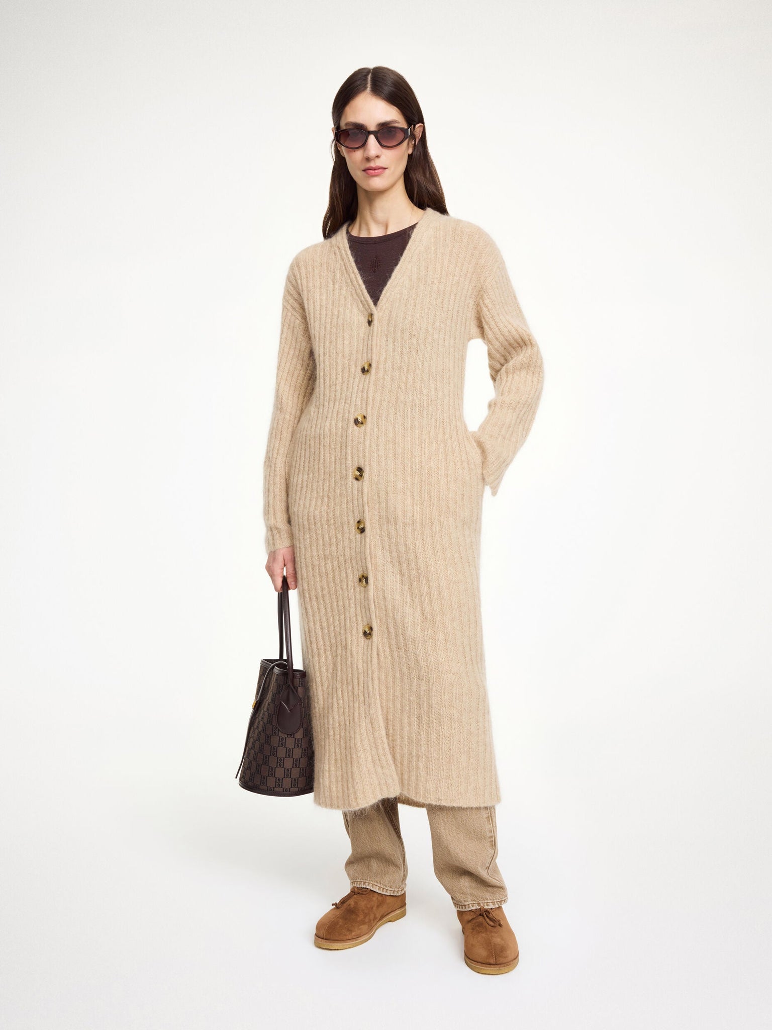 Detail view of Cimonello Maxi Cardigan in Twill Beige, featuring a classic button closure and V-neck.