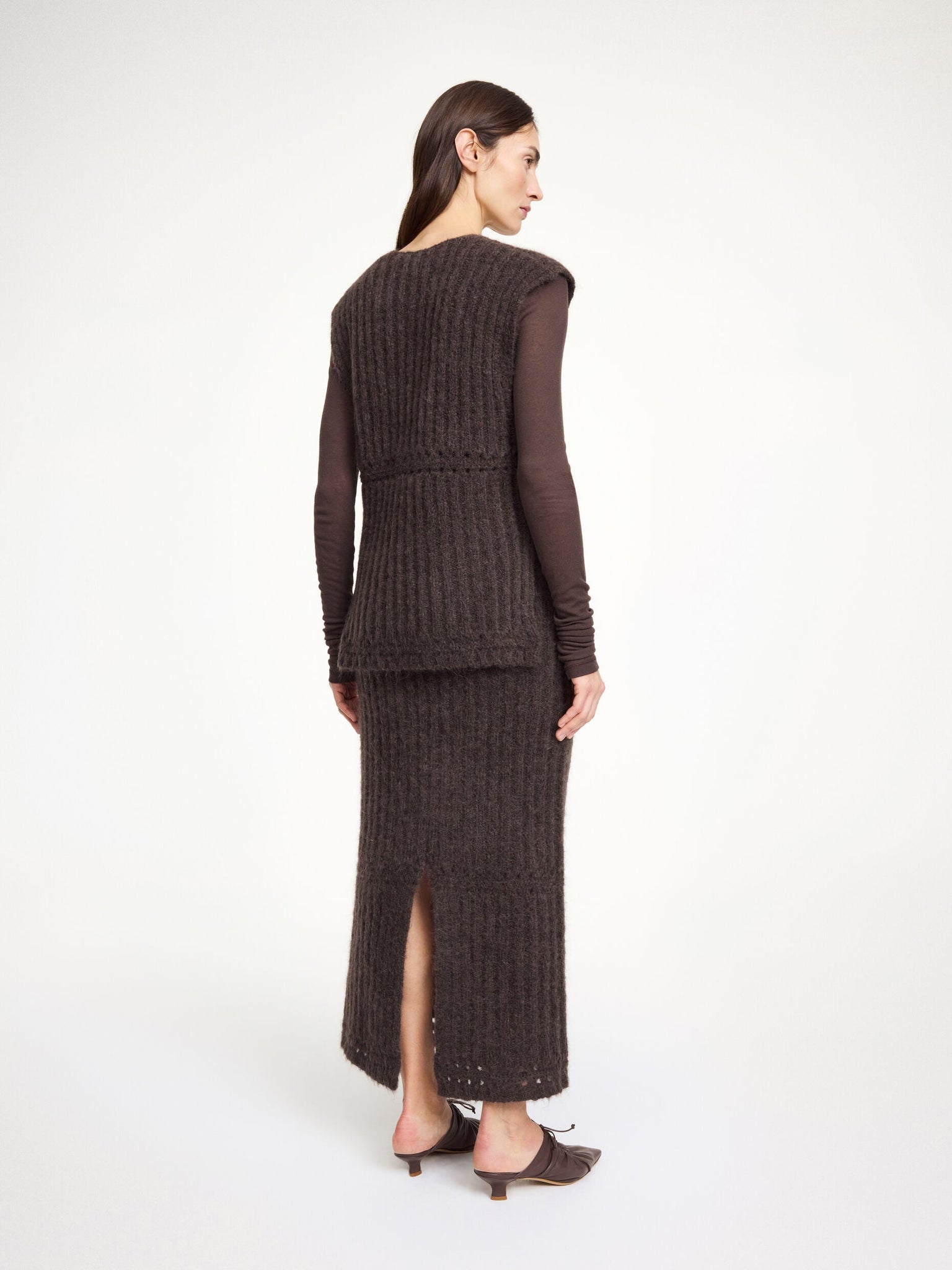 Back view of Sofia Maxi Skirt in Carafe, highlighting the back slit and unique cut-out details by By Malene Birger.