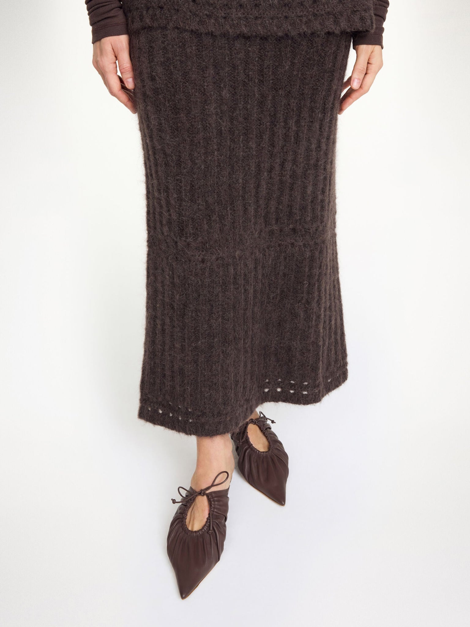 Styling idea with Sofia Maxi Skirt in Carafe paired with Revna sweater vest from By Malene Birger, perfect for layering.