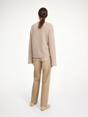 Close-up of the Cierra Sweater in Cobblestone fabric, made from a warm blend of wool, mohair, and polyamide.
