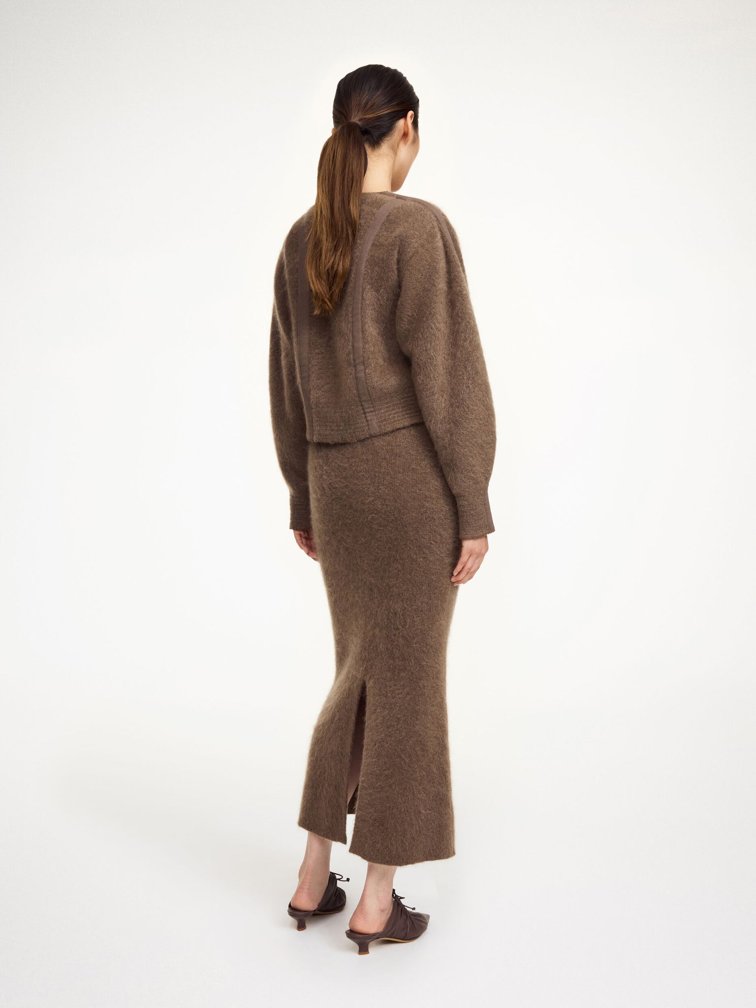 Back view of Pernille Cardigan in Chocolate Chip, featuring graphic stripes and cozy mohair blending.