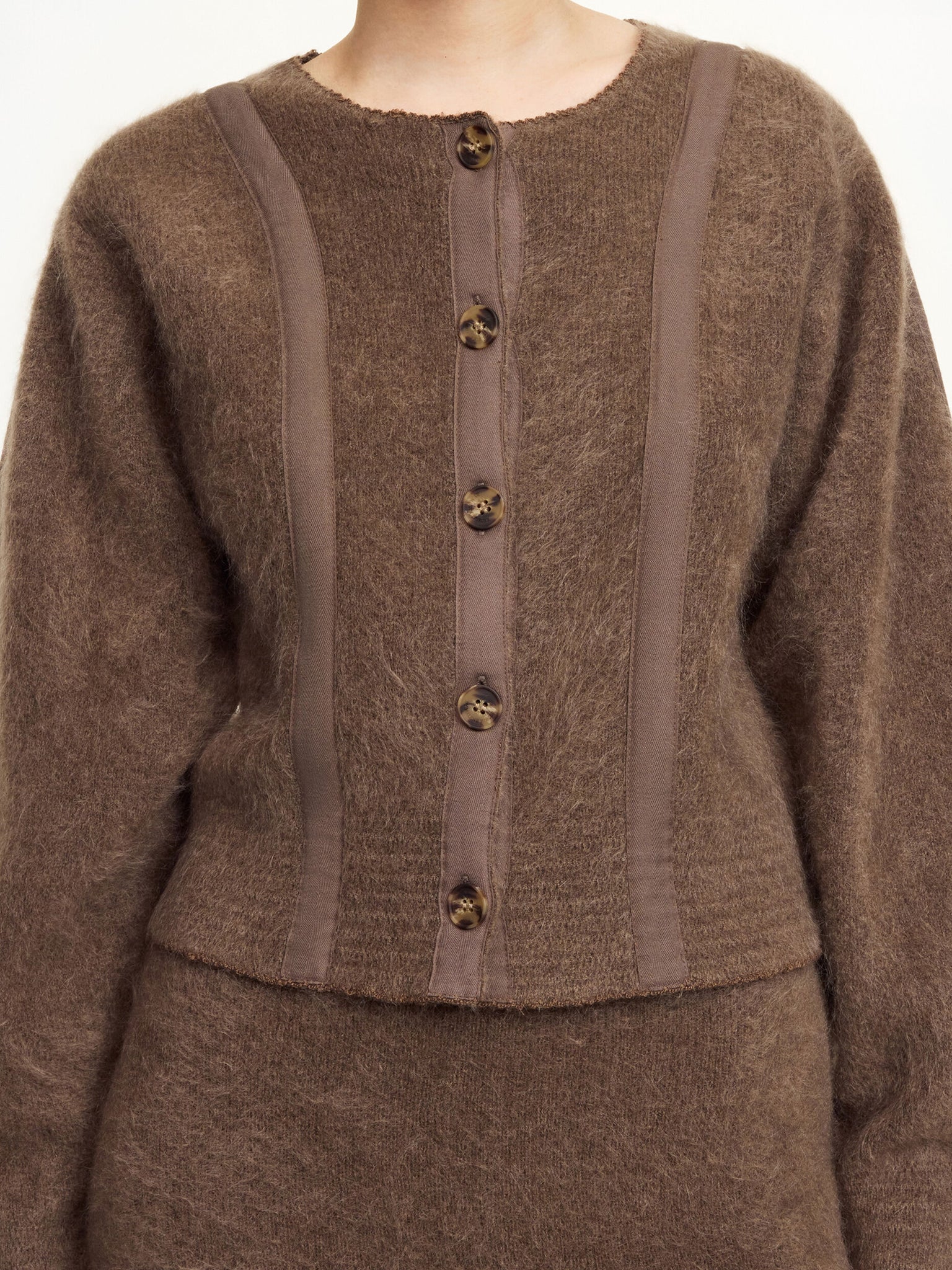 Model wearing Pernille Cardigan in Chocolate Chip, perfect layering piece for chilly weather.