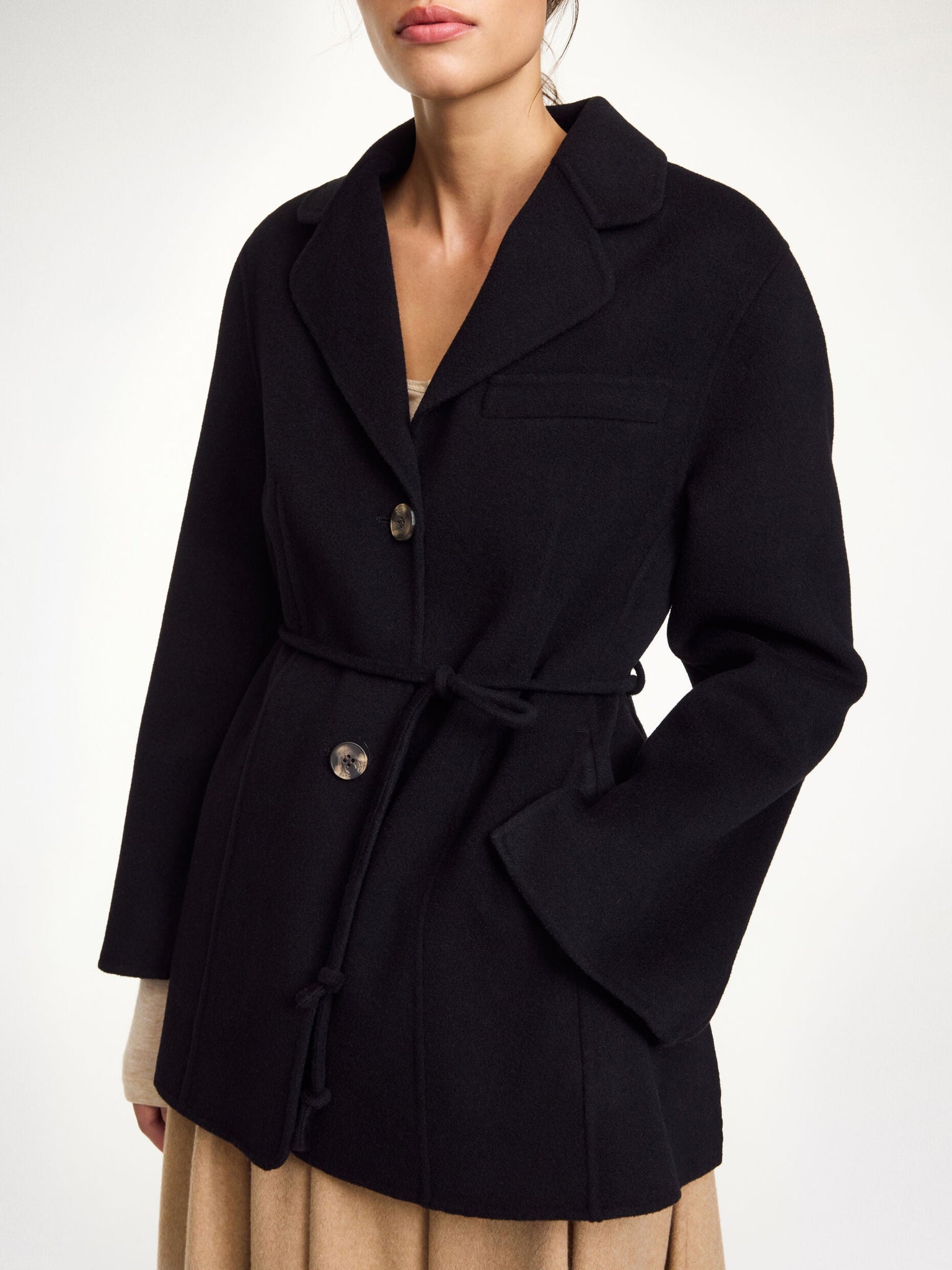 Back view of the Hellen Blazer in Black by By Malene Birger, demonstrating the elegant tailoring and design details.