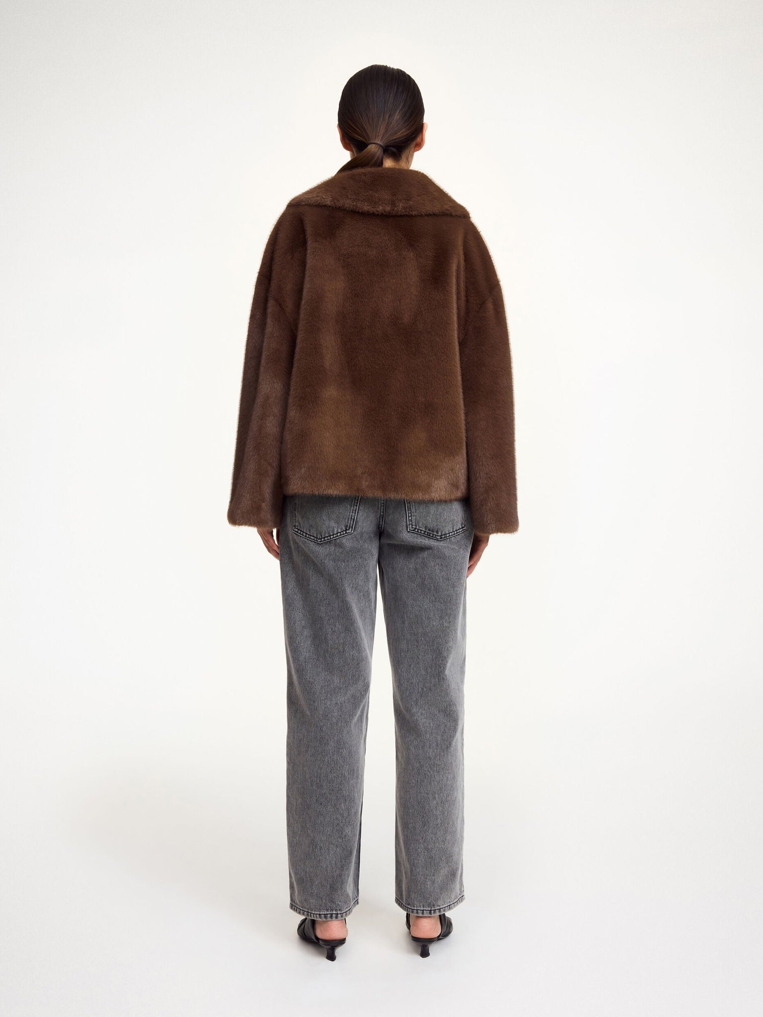 Back view of the Jacquie Faux Fur Jacket in Carafe, perfect for stylish layering in colder months.