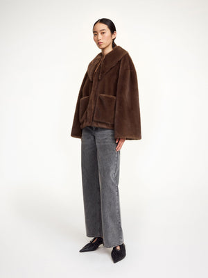 Close-up of the Jacquie Faux Fur Jacket in Carafe, highlighting the detailed faux fur and stylish necktie.