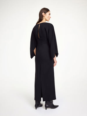 Hella Dress in Black shown in a straight silhouette perfect for after-hours events.