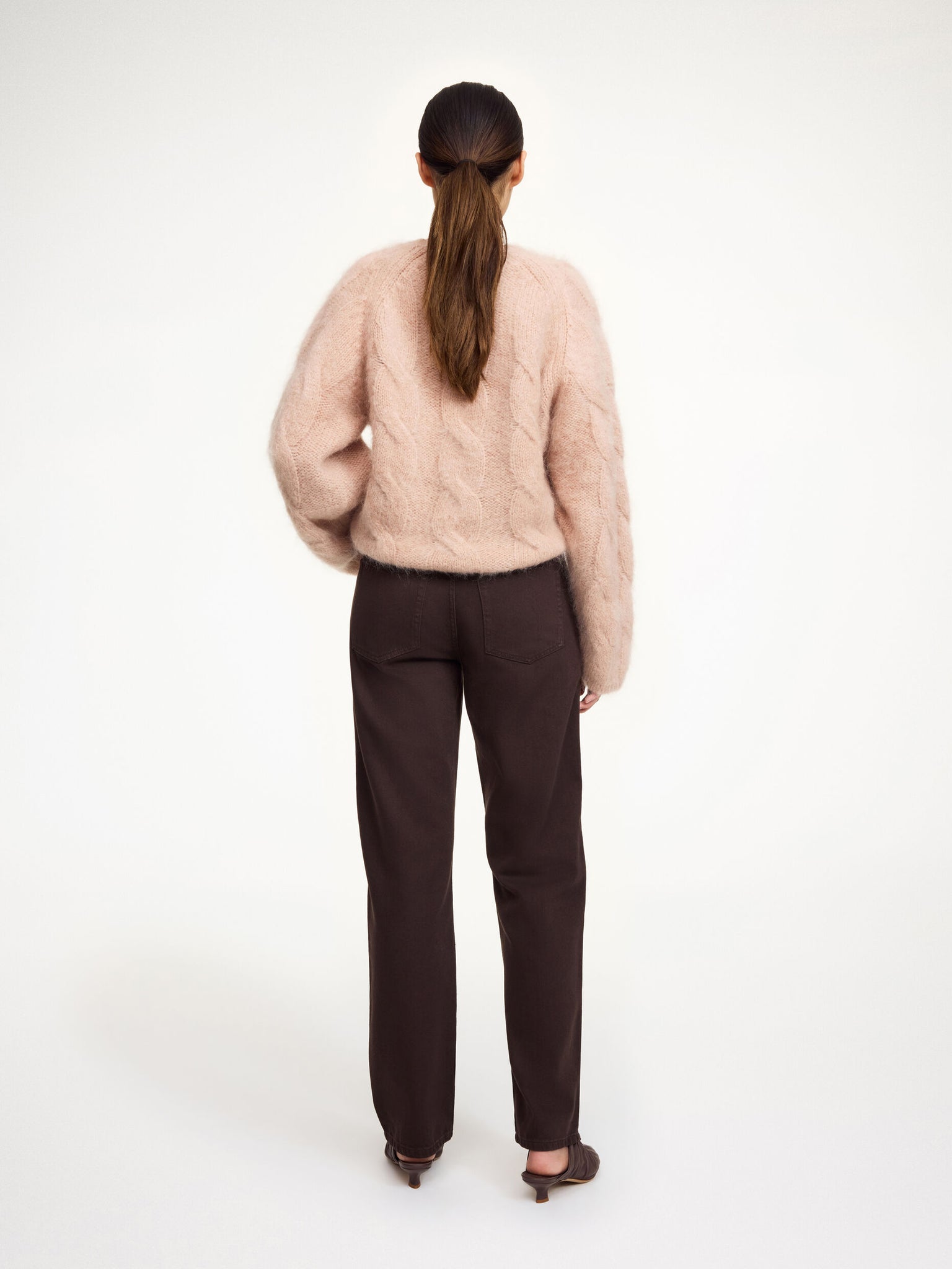 Elliot Sweater in Rose Dust paired with the Eliotta skirt, ideal for layering during chilly weather.