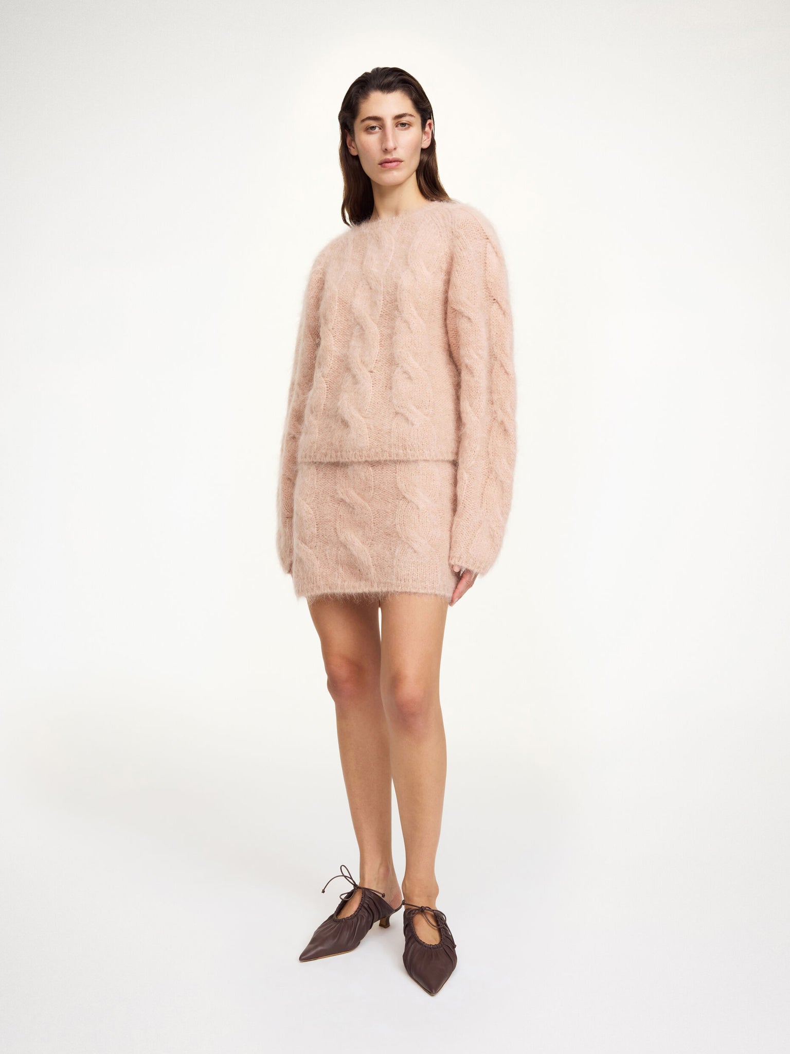 Close-up of the Eliotta Mini Skirt in Rose Dust highlighting the elastic waist and cozy texture.