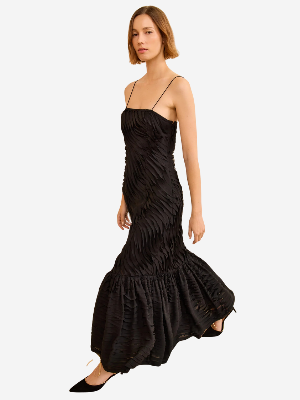 Back view of the Augustina Cami Long Trumpet Dress in Noir, featuring delicate straps and elegant movement.