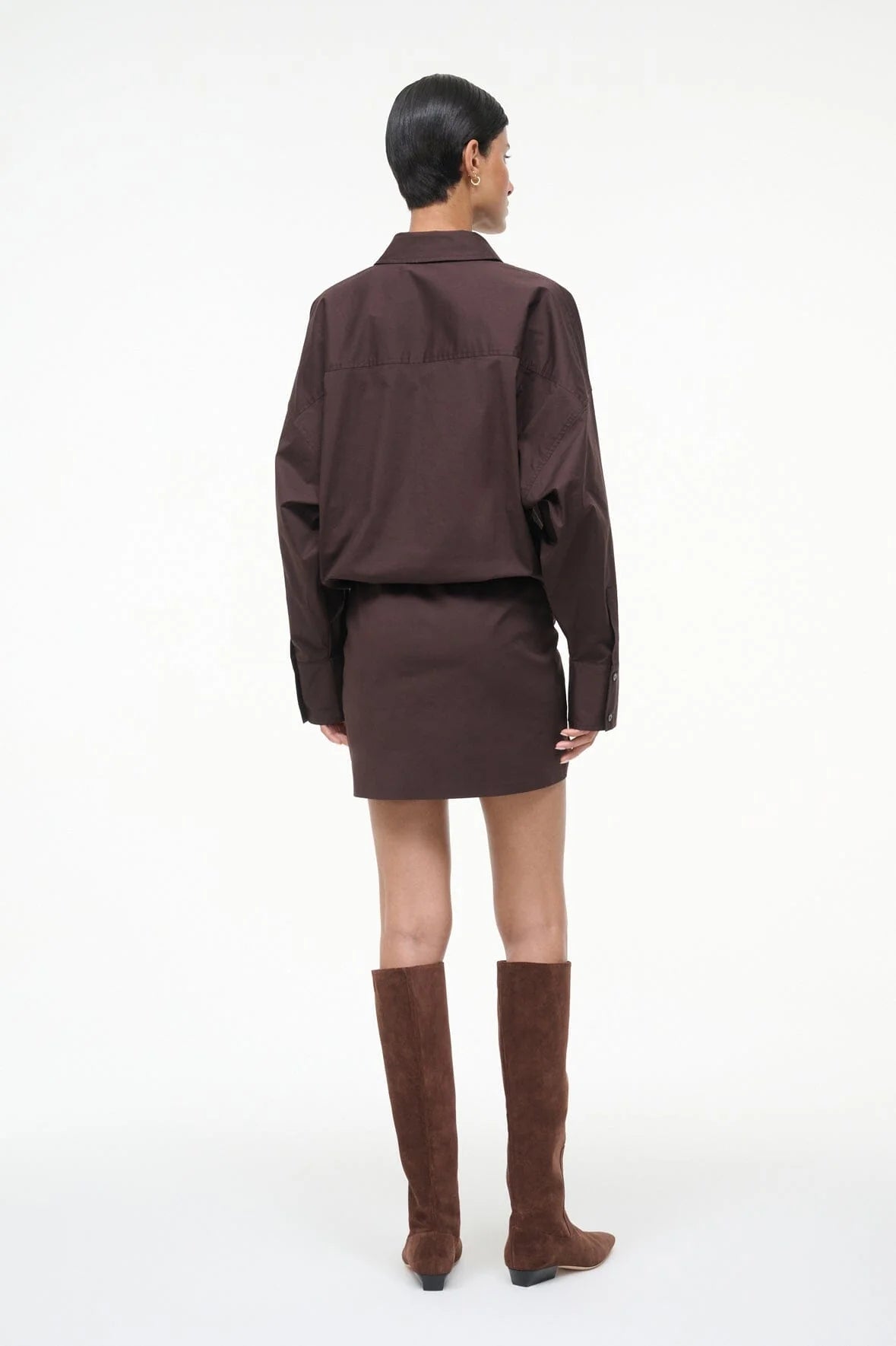 Cynthia Dress in Earth by Staud displayed on a mannequin, highlighting its elegant mini length and sophisticated design.