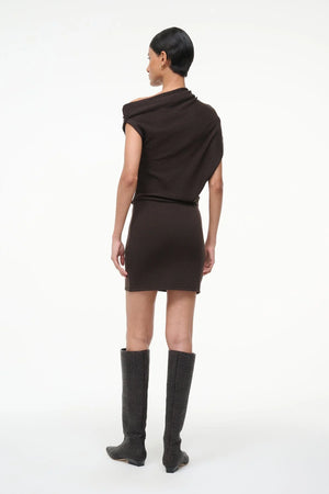 Back view of the Mabel Mini Dress in Earth, highlighting the elegant cut and soft texture of the merino wool.