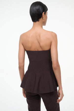 Side view of the Staud Evie Top in Earth, demonstrating the flattering fit and design details.