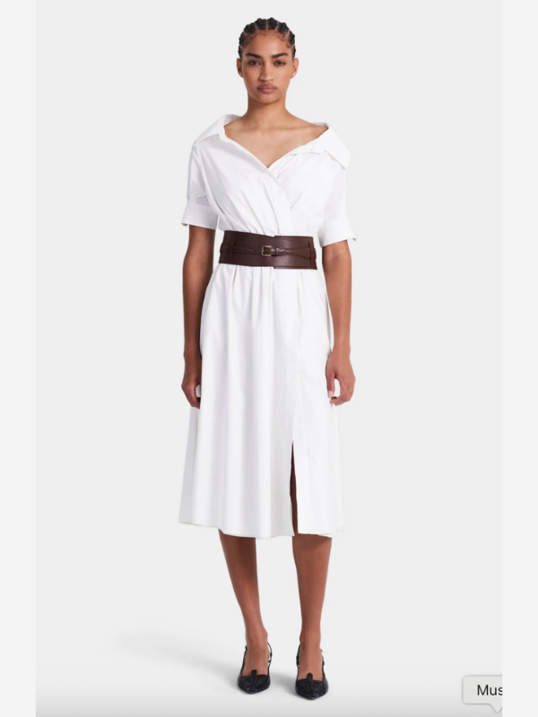 Flat lay of Lydia Dress in Optic White, showcasing the fabric texture and design details before wearing.