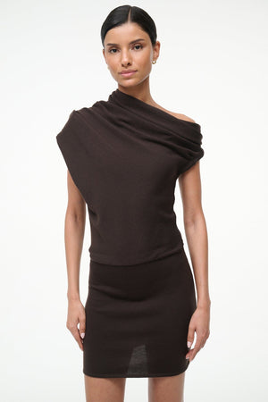 Close-up of the knit texture of the Mabel Mini Dress in Earth by Staud, emphasizing the quality of 100% merino wool.