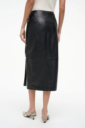 Every detail of the Roman Leather Wrap Skirt in Black by Staud, showcasing the luxurious lamb leather.