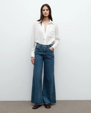 Close-up of the New Joey Shirt in Ivory's spread collar and exposed placket, highlighting its chic details.