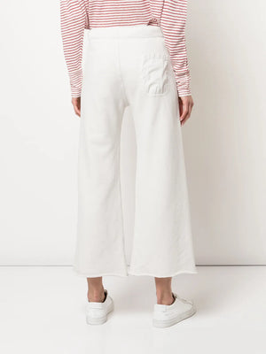 Back view of Nili Lotan Kiki Sweatpant in Chalk, featuring the unique raw-edge hem and cropped length.