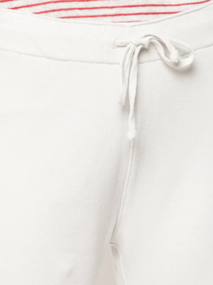 Model in Nili Lotan Kiki Sweatpant in Chalk, illustrating its versatility for home lounging or out-and-about style.