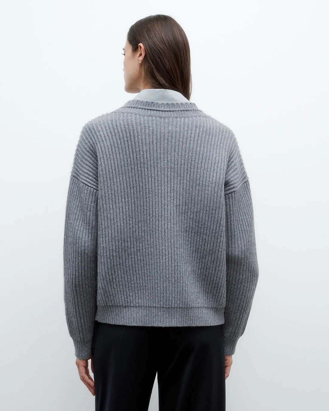 Back view of Cardi in Medium Heather Grey demonstrating the boxy fit.
