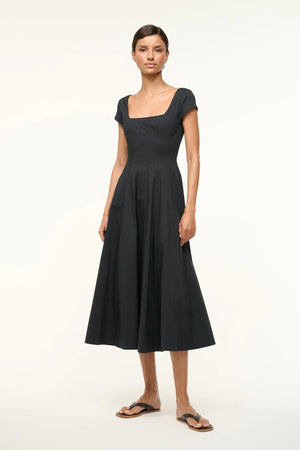 Close-up of the corset-style panel construction of the Short Sleeve Wells Dress in Black.