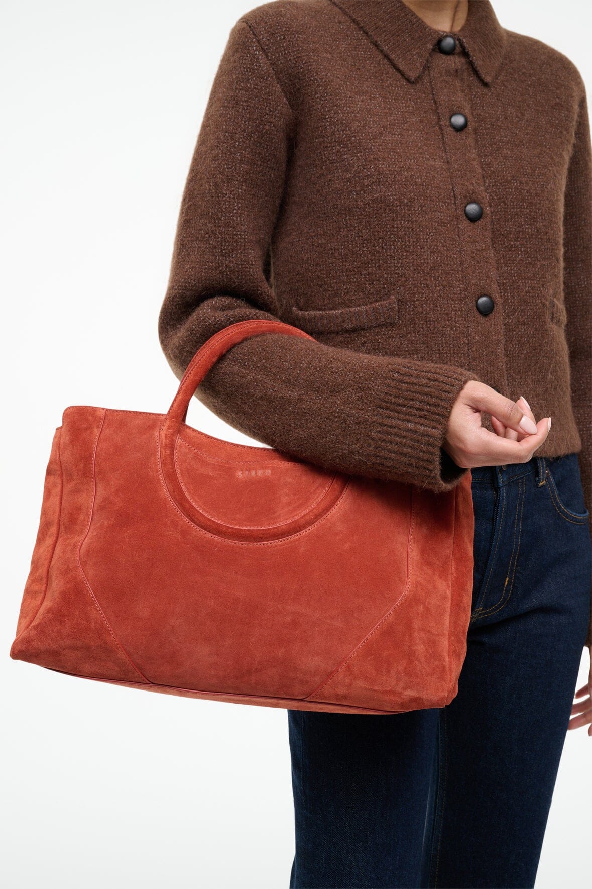 Maude Satchel in Auburn Suede featuring its luxurious 100% cow leather composition.