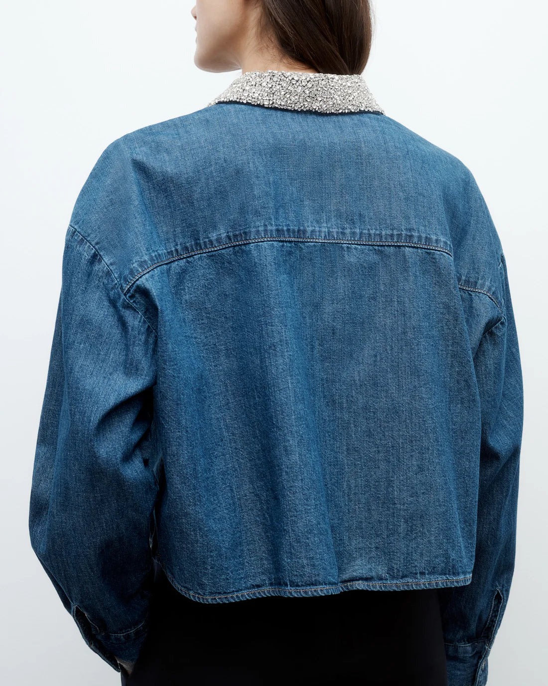 Back view of My Ex's Denim with Crystal Collar in Paris, showing the boxy silhouette and chest patch pocket.