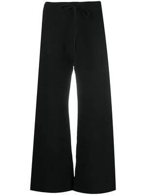 Kiki Sweatpant in Washed Black by Nili Lotan featuring a vintage-inspired wide cropped leg and raw-edge bottom.