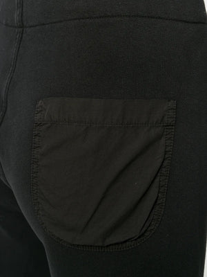 Stylish shot of Kiki Sweatpant in Washed Black, demonstrating its comfortable fit and chic design options.