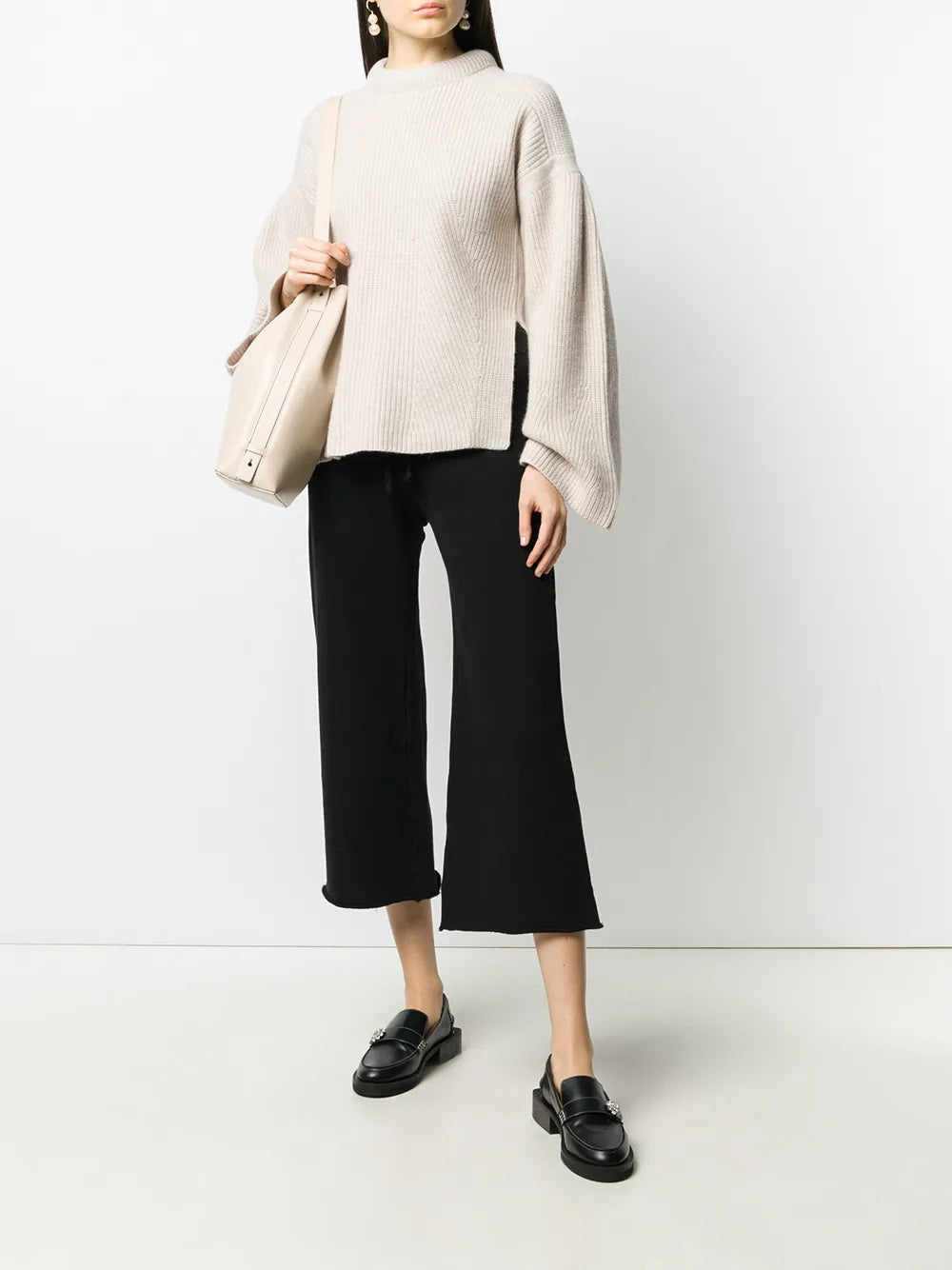 Close-up of Nili Lotan Kiki Sweatpant in Washed Black, showcasing the soft cotton material and flared design.