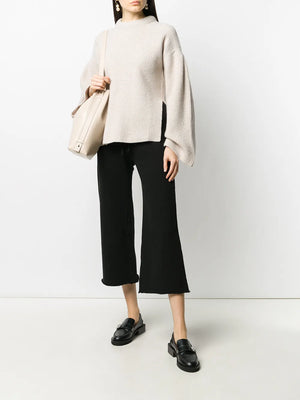 Close-up of Nili Lotan Kiki Sweatpant in Washed Black, showcasing the soft cotton material and flared design.