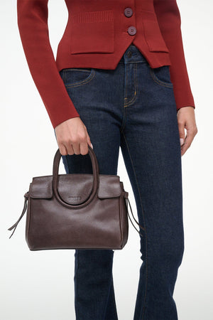 Mini Maude Carryall in Espresso profile view highlighting its compact size and elegant shape.
