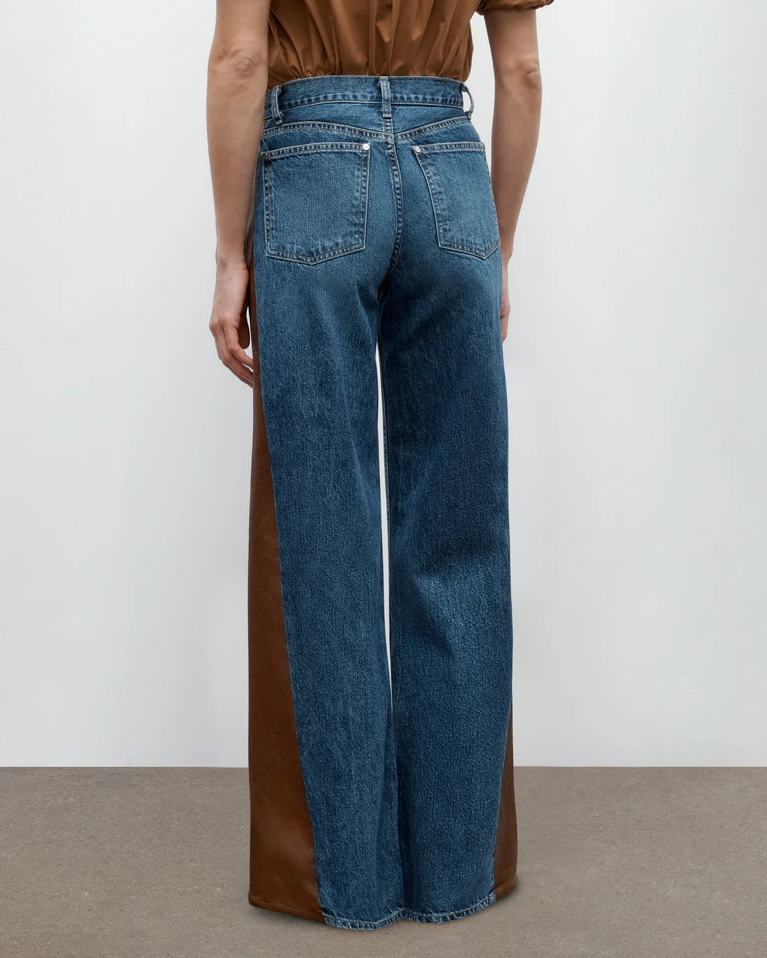 Flat lay of Ramblin Man Jean in Paris/Mahogany made from 100% cotton, perfect for a relaxed look.