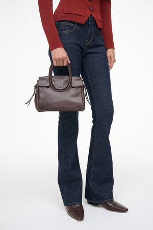 Mini Maude Carryall in Espresso photographed from an angle to showcase the craftsmanship of 100% cow leather.