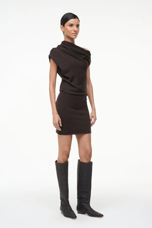 Full view of Staud's Mabel Mini Dress in Earth, perfect for pairing with trendy boots.