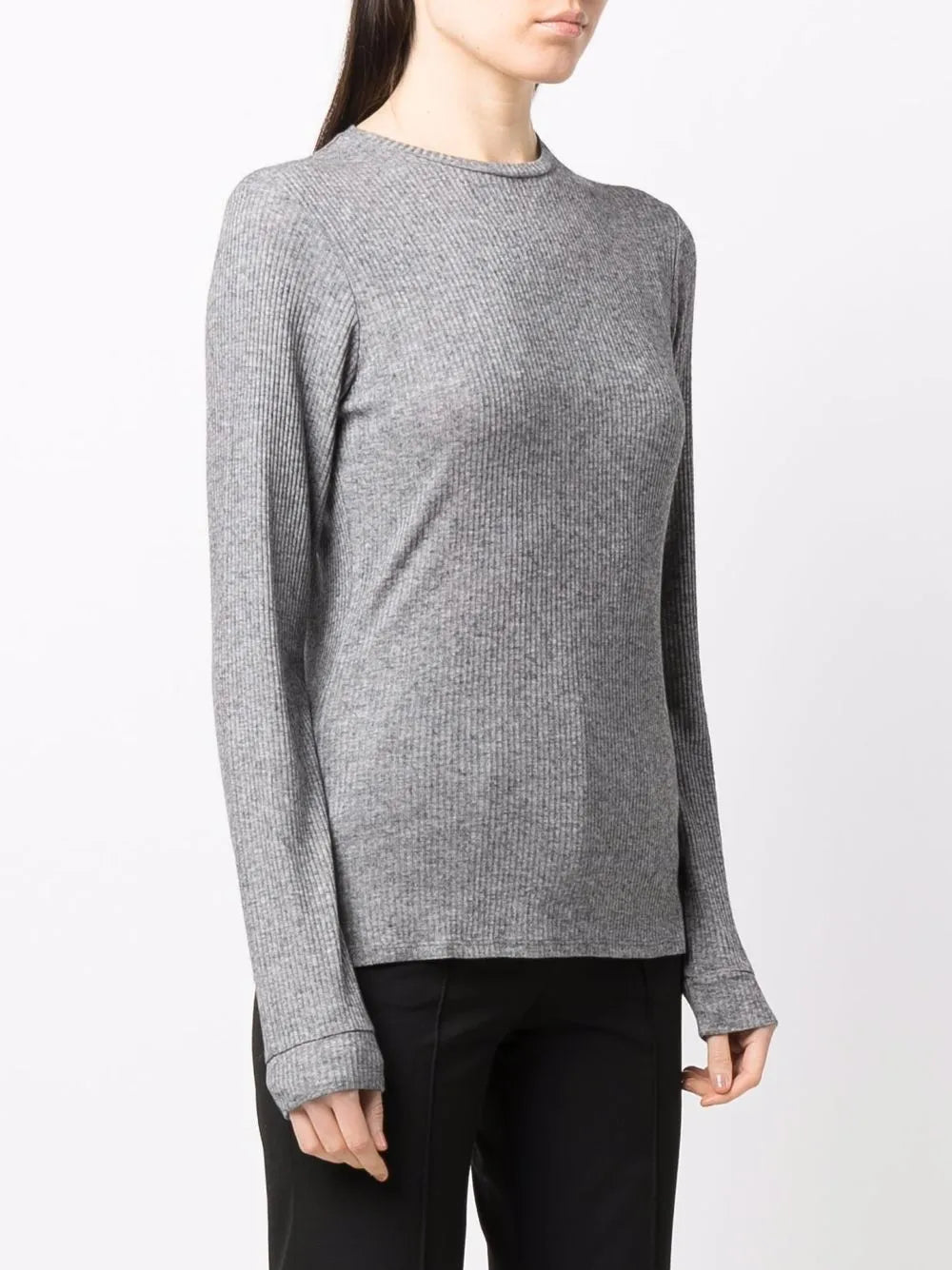 Model wearing Ortigia LDS Ribbed Long Sleeve T-shirt in Grey, demonstrating its versatility as a stand-alone or layered piece.