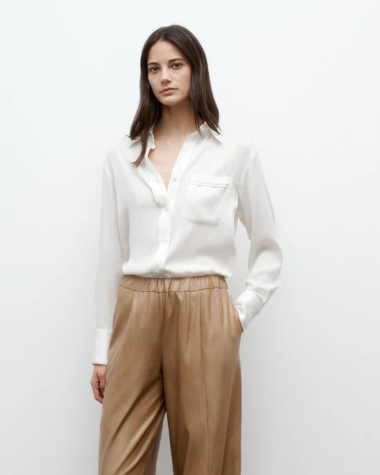 Back view of TWP's Eva with Tux Pant in Kelp/Bone, illustrating the soft suede interior and stylish silhouette.