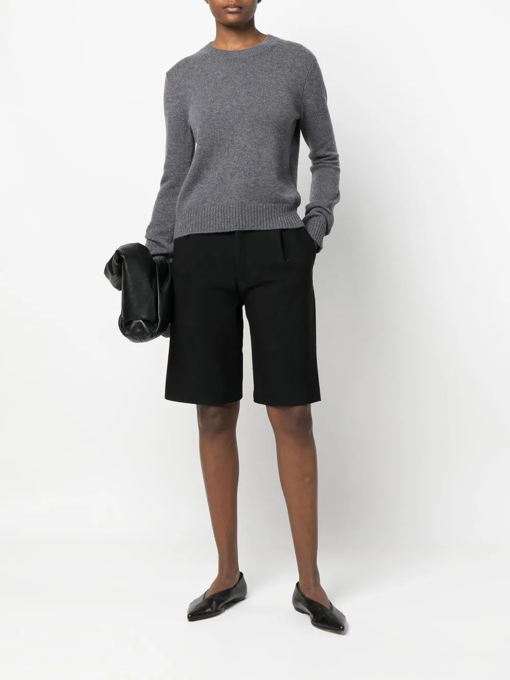 Close-up of the Mable Sweater in Graphite highlighting the soft cashmere fabric and round neck detail.