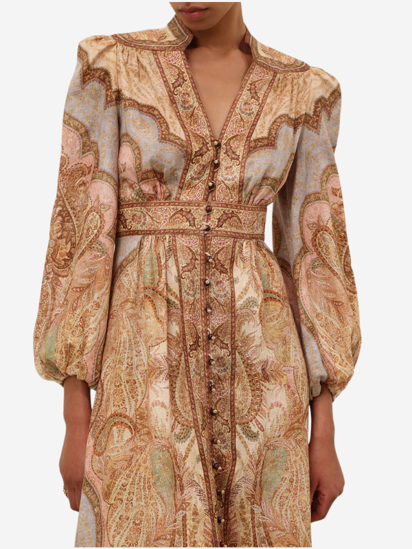 Back view of the Wanderlust Plunge Midi Dress in Tapestry Multi, emphasizing the long sleeves and overall silhouette.