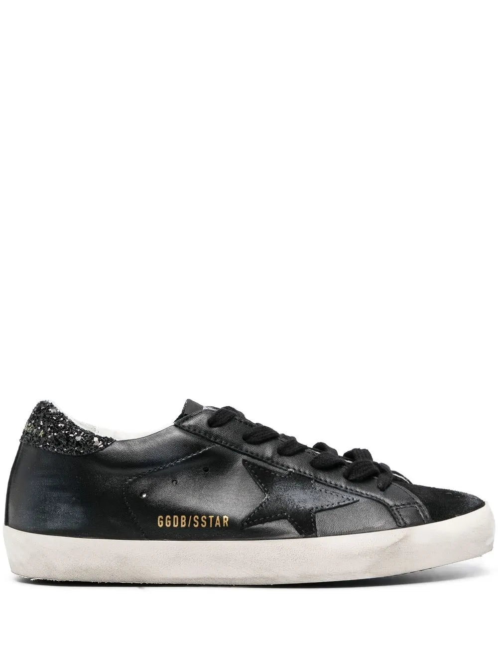 Golden Goose Super-Star in Black featuring a luxurious black nappa leather upper and suede star detail.