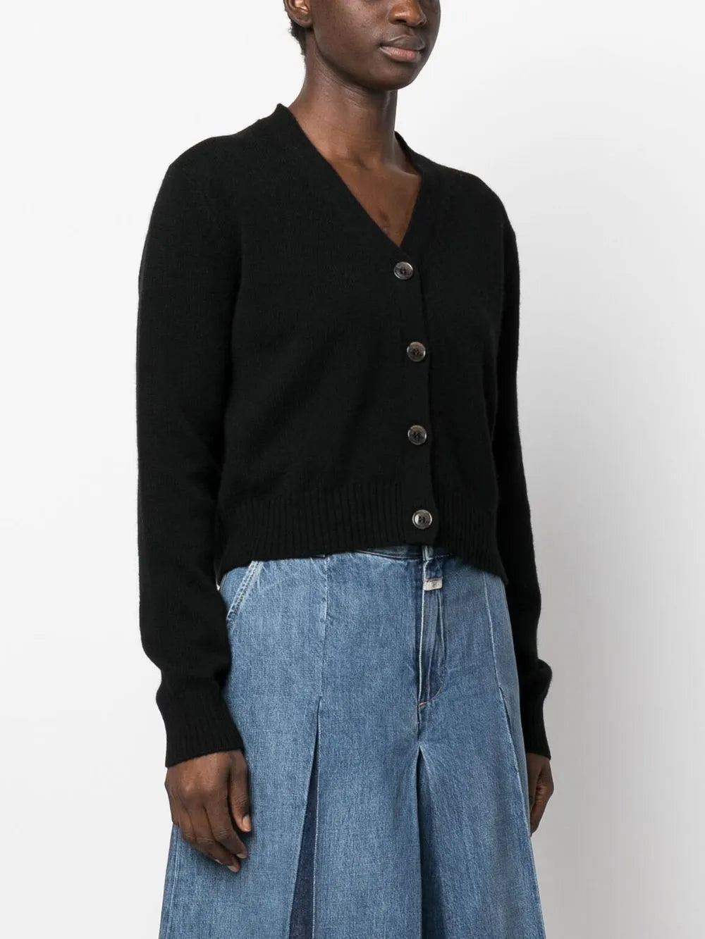 Back view of the Marion Cardigan in Black, highlighting its boxy silhouette and luxurious cashmere composition.