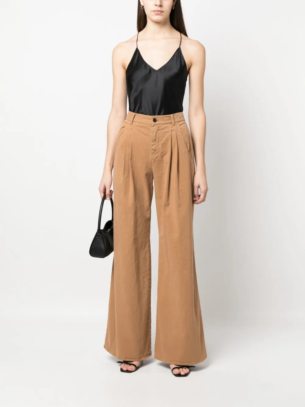 Sleek silhouette of the Emile Cami in Black by Nili Lotan, showcasing the stylish self straps crossing at the center back.