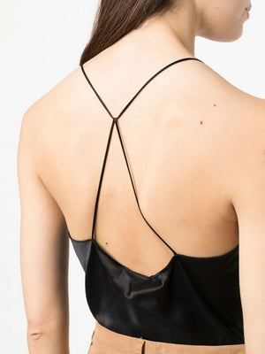 Full-length image of the Emile Cami in Black, perfect for layering or evening wear, emphasizing its chic style.