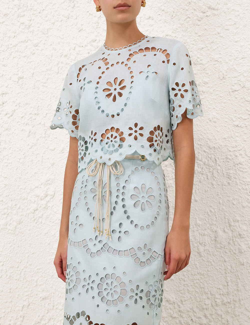 Model wearing the Awaken Embroidered Bodice in Mint, styled for a resort look.