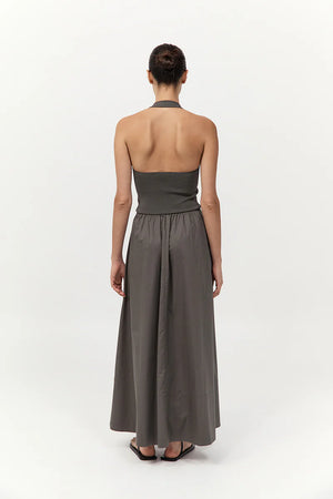 Detail shot of the fabric of the Halter Gathered Dress in Khaki, emphasizing the quality of this must-have halter maxi dress.