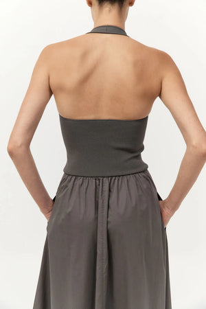 Side view of the Halter Gathered Dress in Khaki, illustrating the beautiful drape of this elegant halter maxi dress.