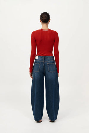 Back view of the Fine Line Long Sleeve Top in Red/Off White from St. Agni, demonstrating the minimalist silhouette.