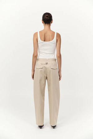 Cotton Barrel Leg Pants in Champagne laid flat to emphasize their trendy design and combination of organic and stretchy materials.