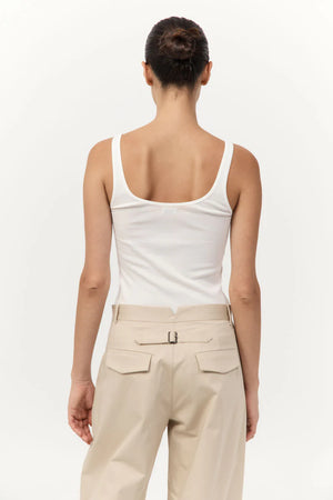 Model styling the Cotton Barrel Leg Pants in Champagne with chic accessories, perfect for a relaxed yet fashionable look.
