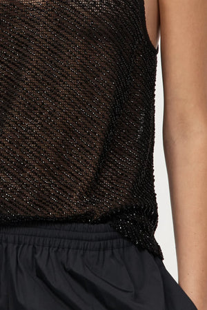 Side view of St. Agni's Glass Beaded Mesh Top in Jet Black, capturing the elegance of the beaded design.