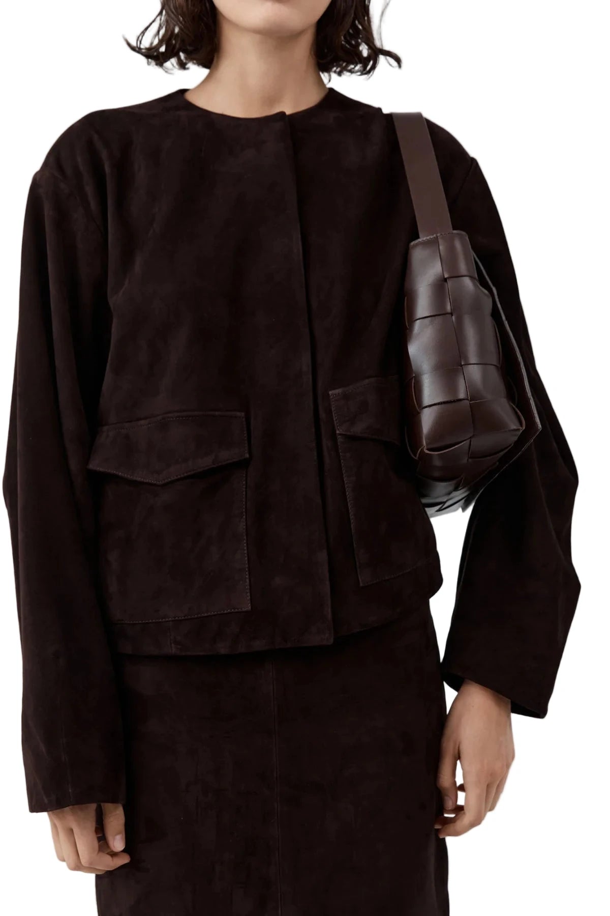 Styling the Woven Envelope Mini Tote in Chocolate with a casual outfit, perfect for everyday use.